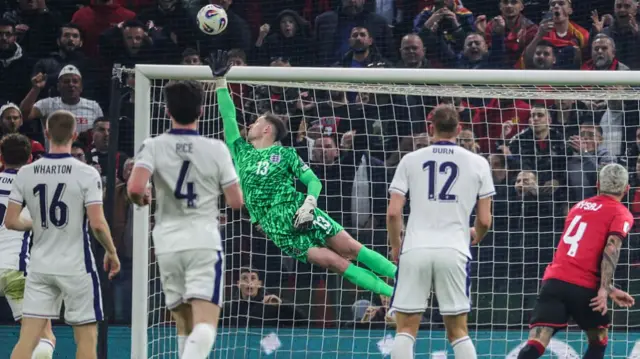 Dean Henderson at full stretch to tip a shot from an Albania player over the crossbar.
