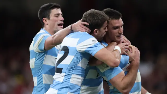 Argentina celebrate during victory over Wales