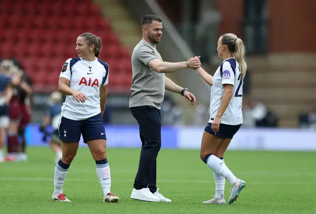Martin Ho congratulates his players after a positive result