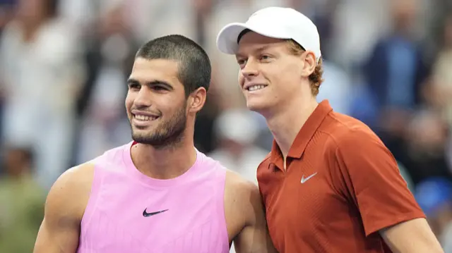 Carlos Alcaraz and Jannik Sinner pose at the US Open