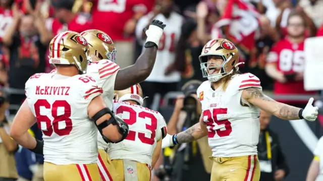 San Francisco 49ers tight end George Kittle celebrates a touchdown against the Arizona Cardinals