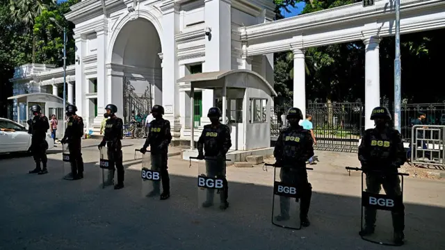Border Guard Bangladesh (BGB) personnel stand guard at the International Criminal Tribunal premises in Dhaka on November 17, 2025. Bangladeshi judges will deliver their verdict on November 17, in the crimes against humanity trial of fugitive former prime minister Sheikh Hasina, a highly anticipated ruling before the first polls since her overthrow.