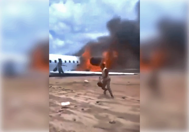 A screengrab from one of the videos shows the aircraft off the runway and the rear of the fuselage on fire