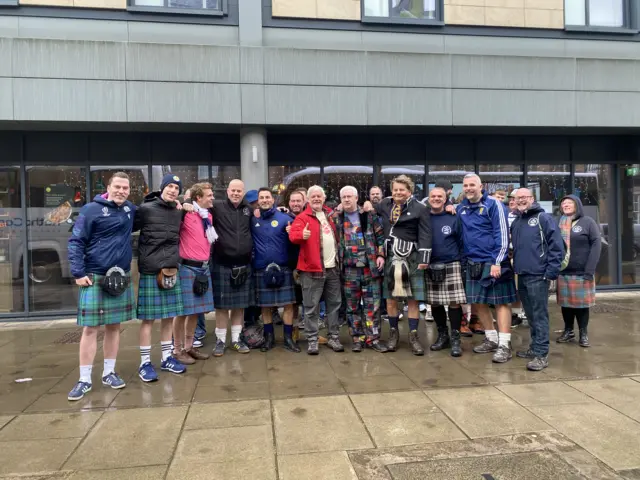 Edinburgh Tartan Army, many men wearing kilts