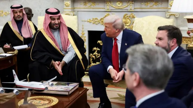Trump and MBS speak in the Oval Office as officials from both countries look on