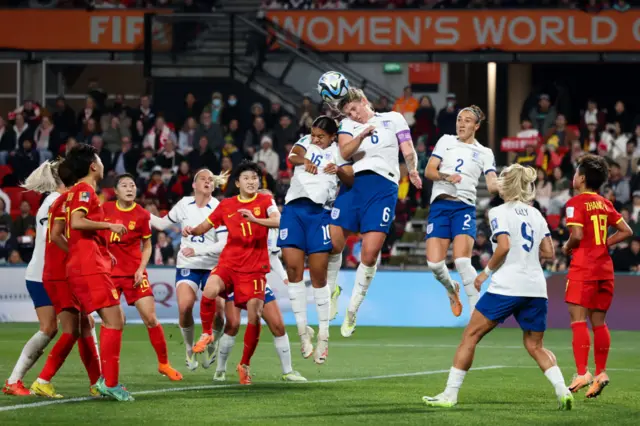 Millie Bright of England heads the ball