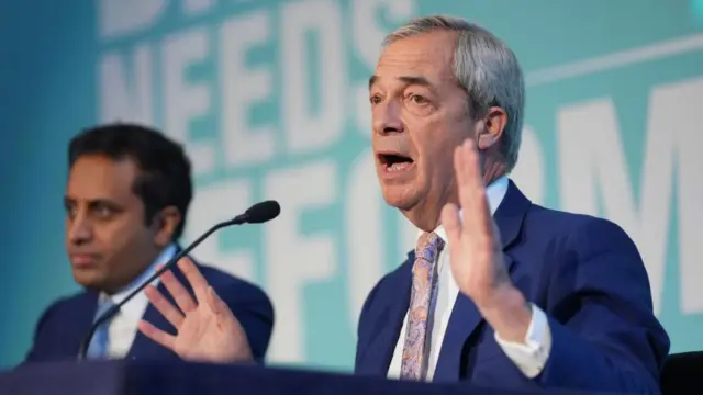 Reform UK leader Nigel Farage (right) speaking at a news conference in London with the party's head of policy Zia Yusuf (left)