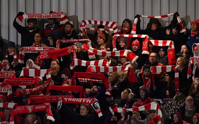 Arsena fans lift scarves aloft