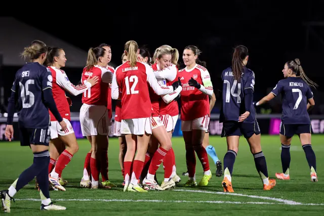Russo is mobbed after her second goal