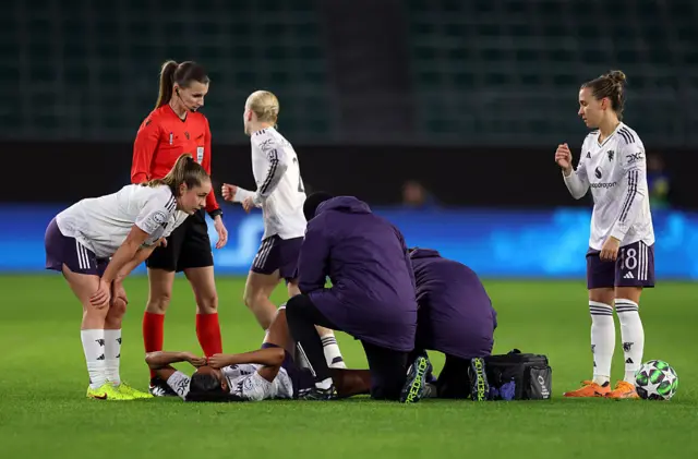 Riviere is tended to by medics