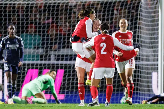 Russo is mobbed after her second goal