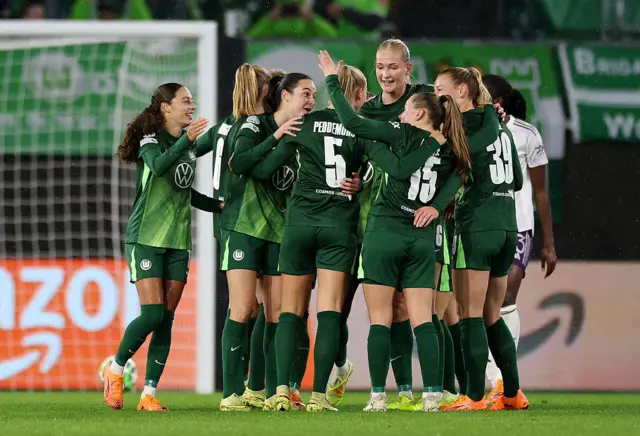 Wolfsburg celebrate their second goal