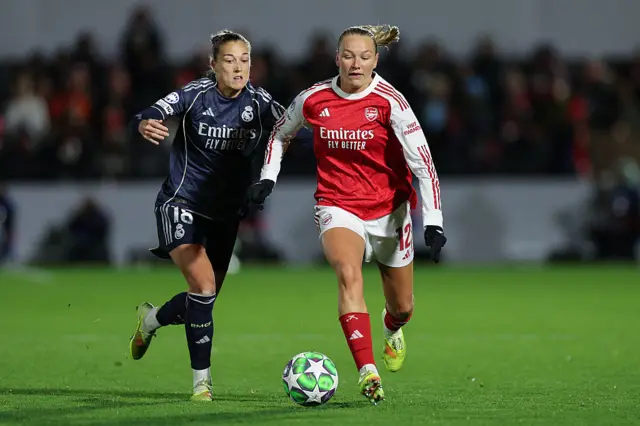 Maanum runs past Angeldahl