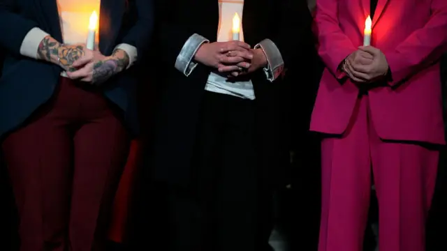 Jeffrey Epstein abuse survivors gather for a vigil at the US Capitol
