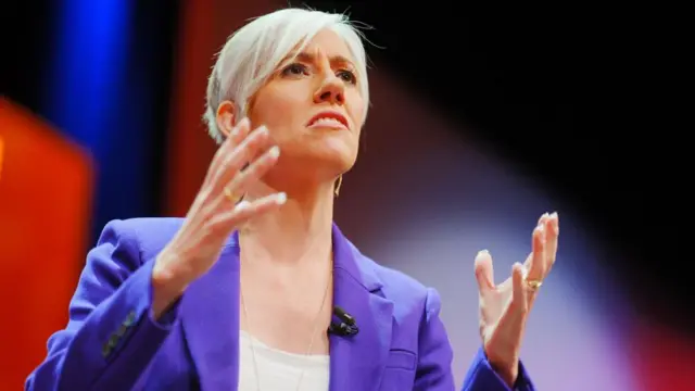 A file photo of Daisy Cooper speaking on stage