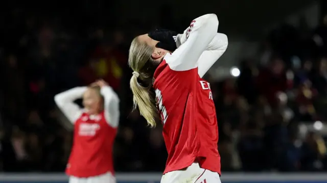 Russo covers her face after missing a hat-trick opportunity