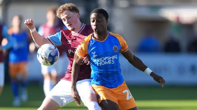 South Shield's Caden Kelly (left) and Shrewsbury Town's Ismeal Kabia