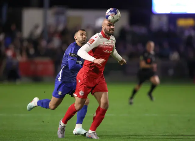 Gainsborough Trinity's Jonathon Margetts and Accrington Stanley's Farrend Rawson