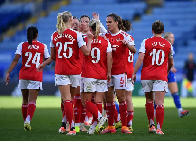 Arsenal's Stina Blackstenius celebrates scoring their third goal with Mariona Caldentey
