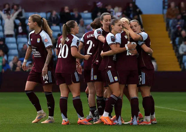 Georgia Mullett of Aston Villa celebrates scoring her team's first goal with her teammates during the Barclays Women's Super League match between Aston Villa and Everton at Villa Park on November 02, 2025 in Birmingham, England.