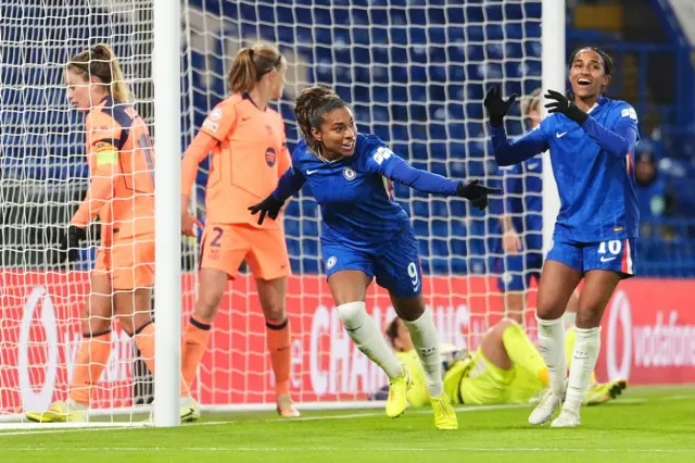 Macario celebrates scoring Chelsea's second as Girma reacts to the offside flag