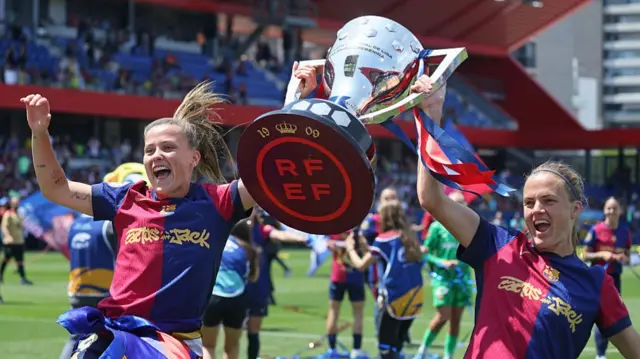 Claudia Pina and Irene Paredes celebrate the Liga F title