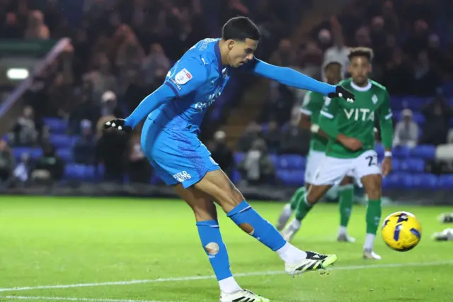 Peterborough United midfielder Brandon Khela (8) scores