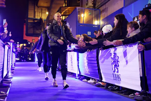 Chelsea players walking into Stamford Bridge
