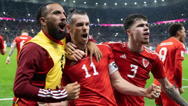 Gareth Bale celebrates with Neco Williams