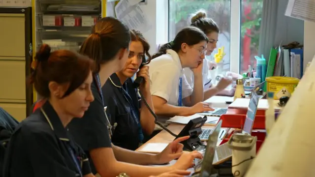 Staff taking calls in hospital