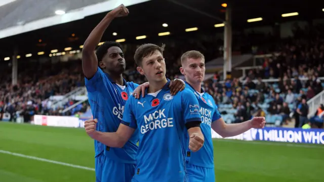 Peterborough's Harry Leonard celebrates scoring with his teammates in the 5-0 win over AFC Wimbledon