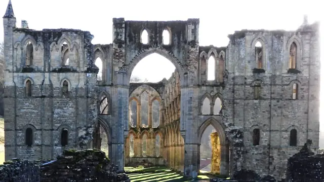 The picture shows the abbey on a wintry morning