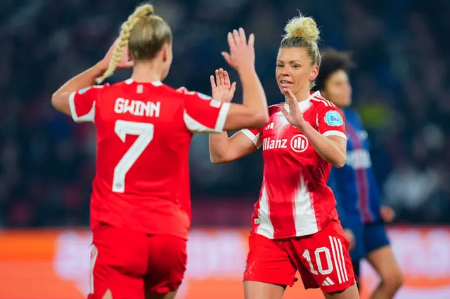 Linda Dallmann celebrates a goal with a teammate