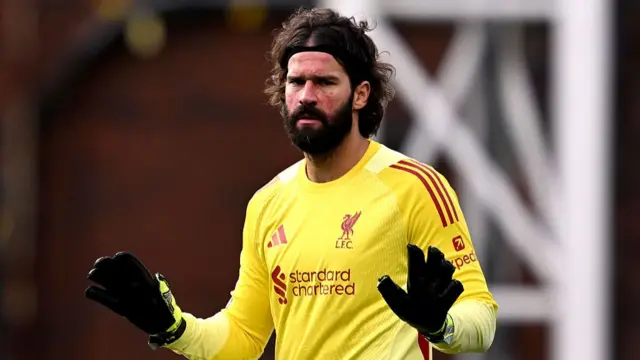 Alisson Becker playing for Liverpool