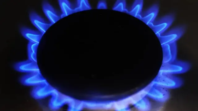 A gas burner on a hob