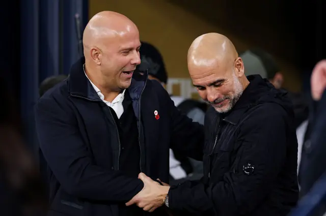 Arne Slot and Pep Guardiola