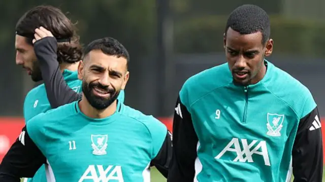 Mohamed Salah and Alexander Isak