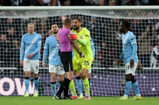 Manchester City's Gianluigi Donnarumma remonstrates with referee Samuel Barrott after Newcastle United's Harvey Barnes scores their second goal