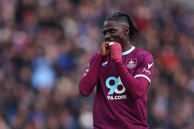Loum Tchaouna of Burnley reacts during the Premier League match between Burnley and Chelsea at Turf Moor on November 22, 2025 in Burnley, England.