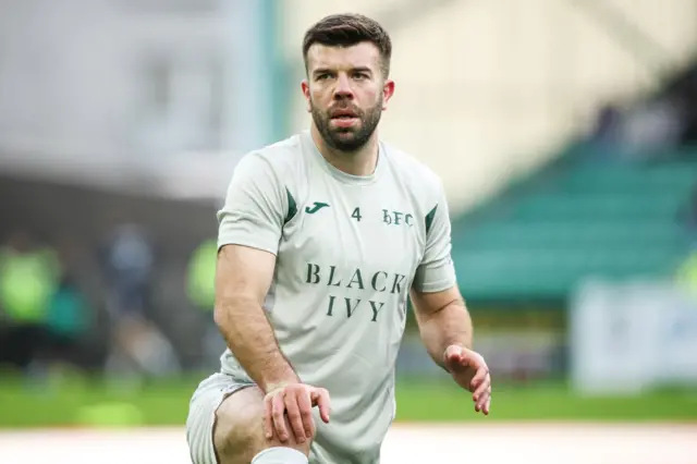 Grant Hanley warming up at Easter Road