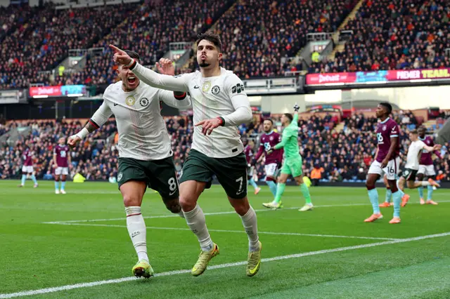 Pedro Neto of Chelsea celebrates scoring his team's first goal during the Premier League match between Burnley and Chelsea at Turf Moor on November 22, 2025 in Burnley, England.