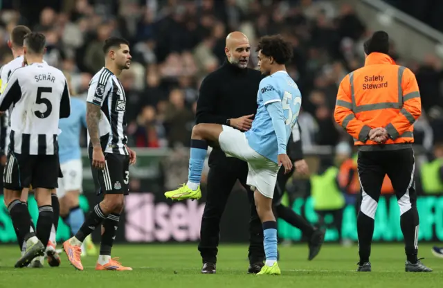 Manchester City manager Pep Guardiola looks dejected after the match