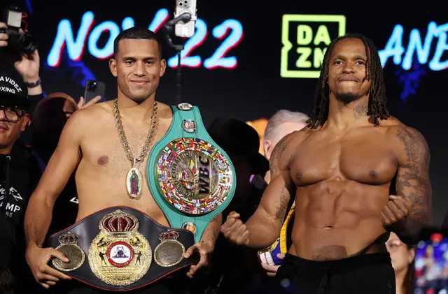 David Benavidez holds his WBC light-heavyweight title and stands next to Anthony Yarde