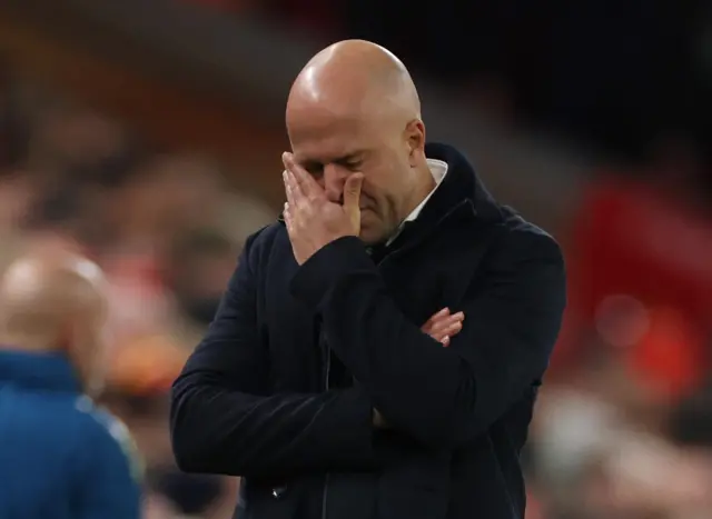 Arne Slot reacts at Anfield