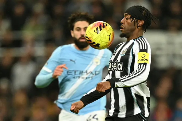 Newcastle United's English midfielder #20 Anthony Elanga controls the ball during the English Premier League football match between Newcastle United and Manchester City at St James' Park in Newcastle-upon-Tyne, north east England on November 22, 2025.