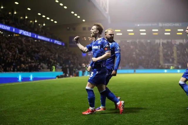 Gillingham celebrate a goal in the 2-2 draw with Crawley
