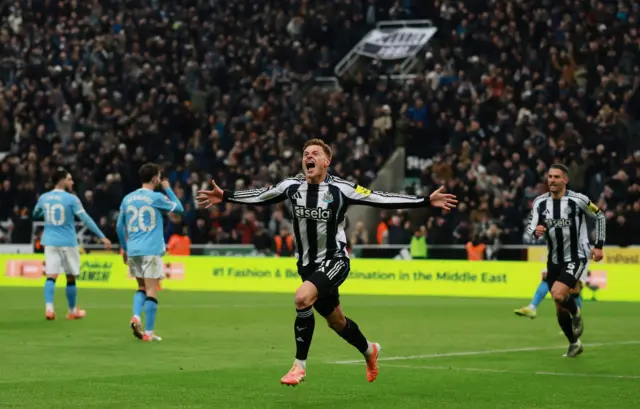 Newcastle United's Harvey Barnes celebrates scoring their second goal.