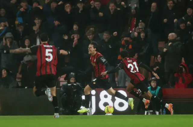 AFC Bournemouth's Enes Unal celebrates scoring their second goal with Amine Adli and Marcos Senesi