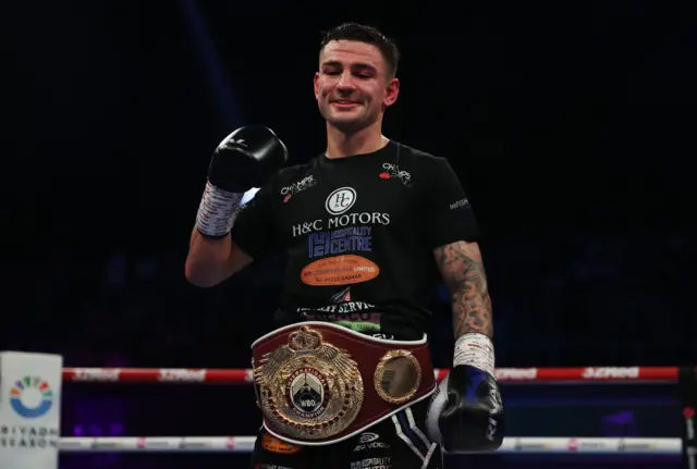 Sam Noakes holds up his fist