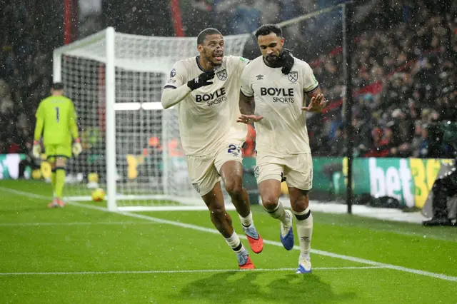 Callum Wilson of West Ham United (R) celebrates scoring his team's second goal with teammate Jean-Clair Todibo during the Premier League match between Bournemouth and West Ham United at Vitality Stadium on November 22, 2025 in Bournemouth, England.